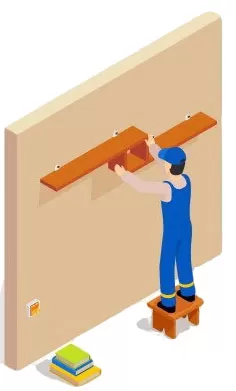 Handyman installing a wall-mounted shelf using leveling tools during a home improvement project